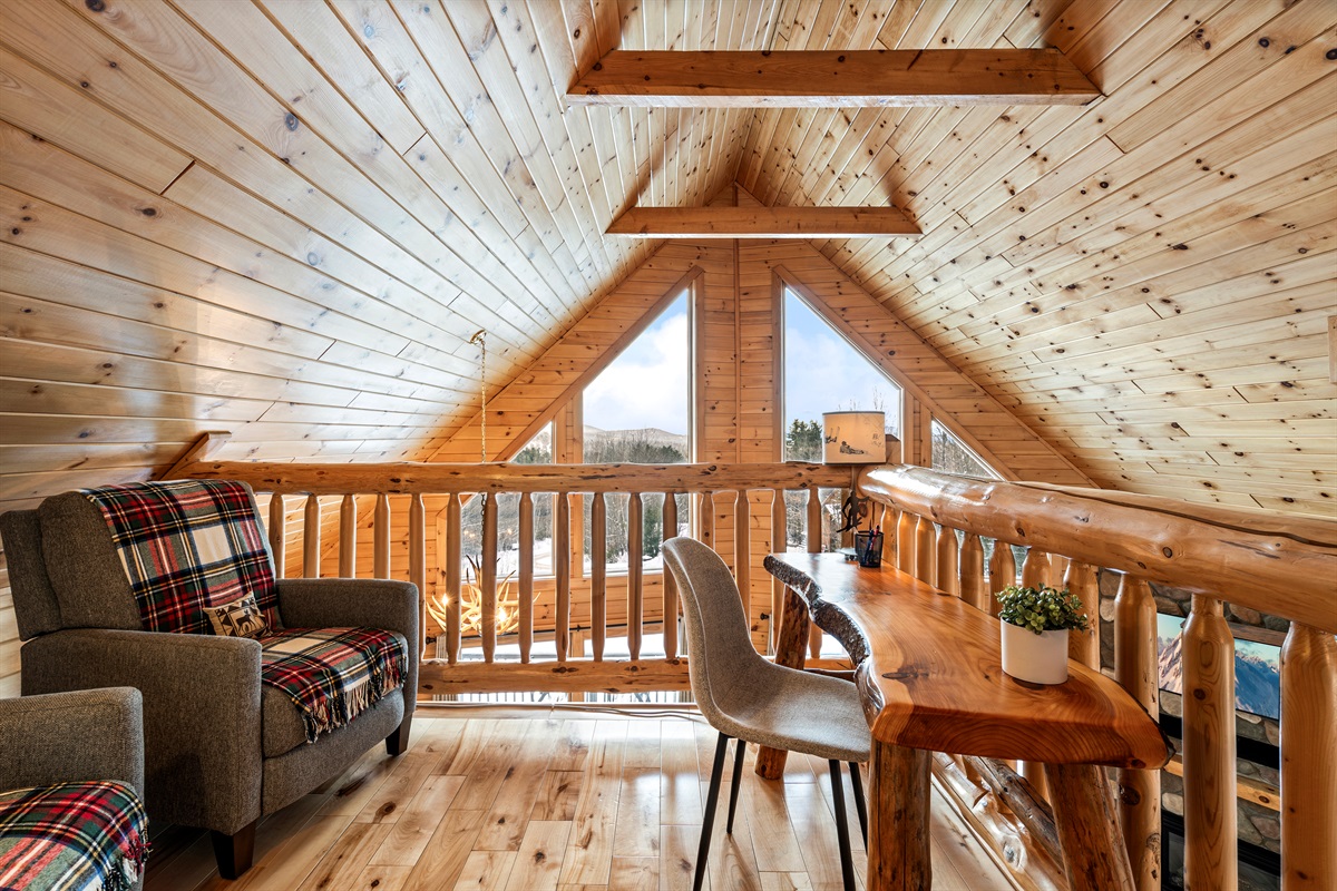 A bright, comfortable workspace with inspiring mountain scenery.