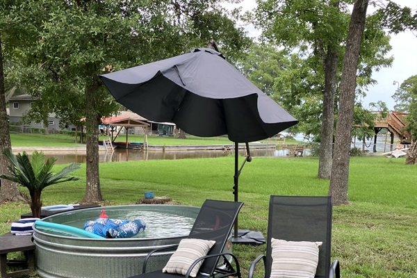 Enjoy relaxing in the 8' Cowboy Stock Tank Pool!