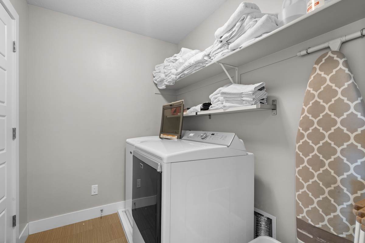 Convenient upstairs laundry room.