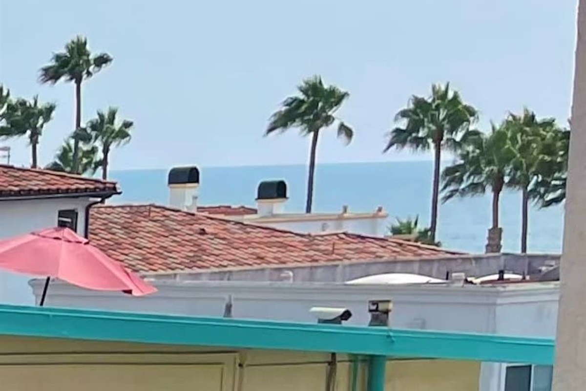 Peek-a-boo ocean view (this is zoomed in) from balcony