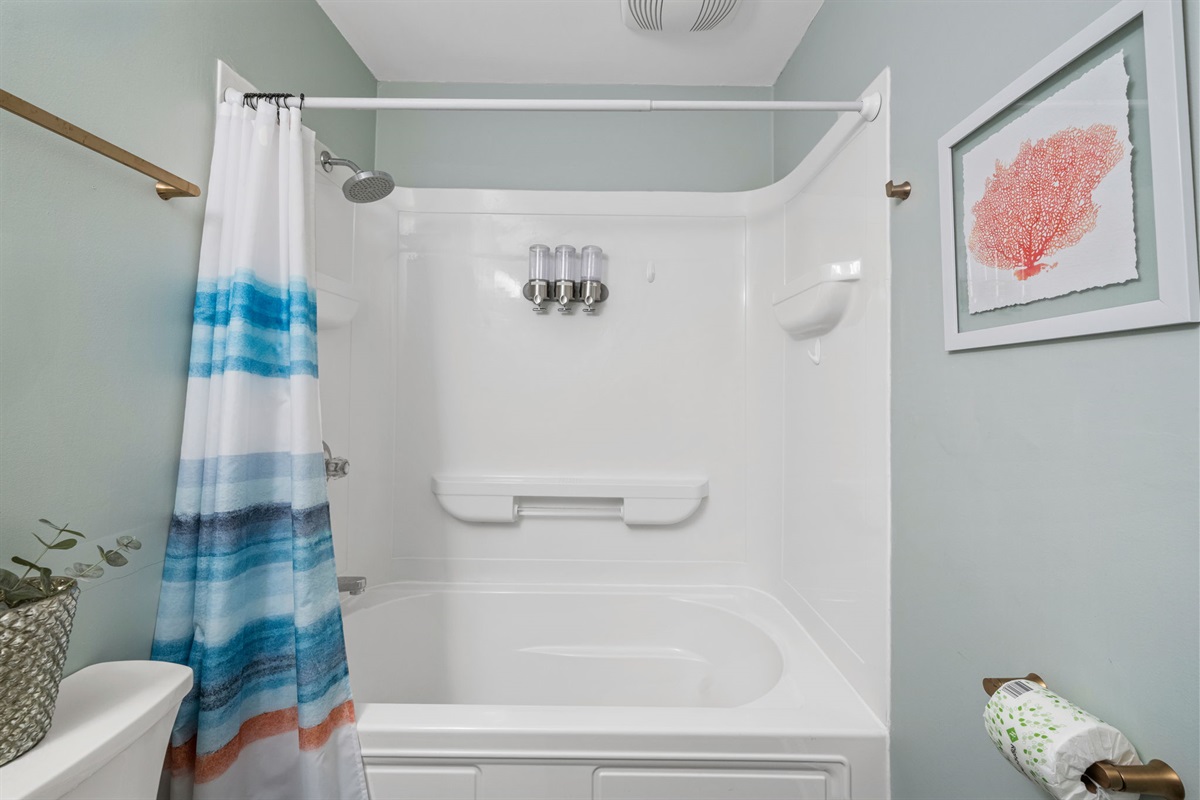 Hallway Bathroom 2 With Tub and Shower Combo | Shared by Bedroom 2 and 4 | IOP Escapes Beach Blessing | 3705 Hartnett Blvd, Isle of Palms, SC