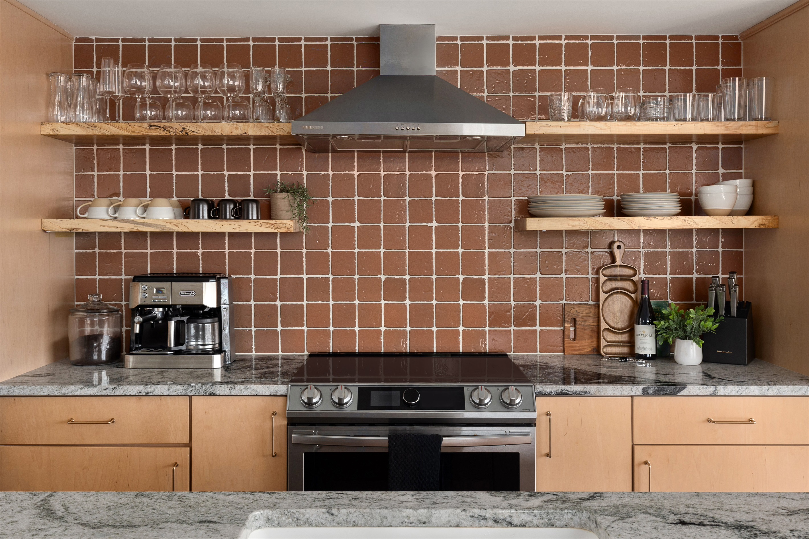 {Kitchen} Elevated dining starts here: premium cookware, plenty of gourmet coffee, and room for everyone to gather.