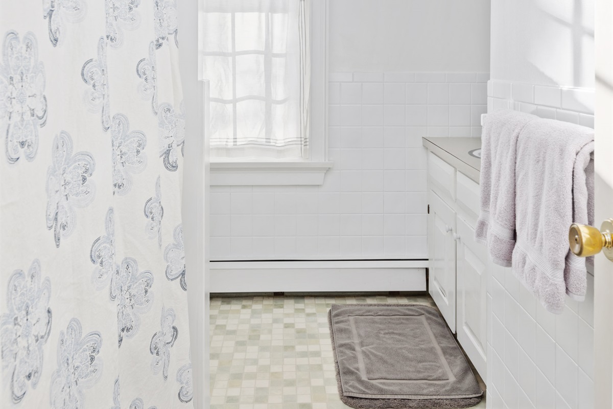 Shared Bathroom at top of landing including standard tub