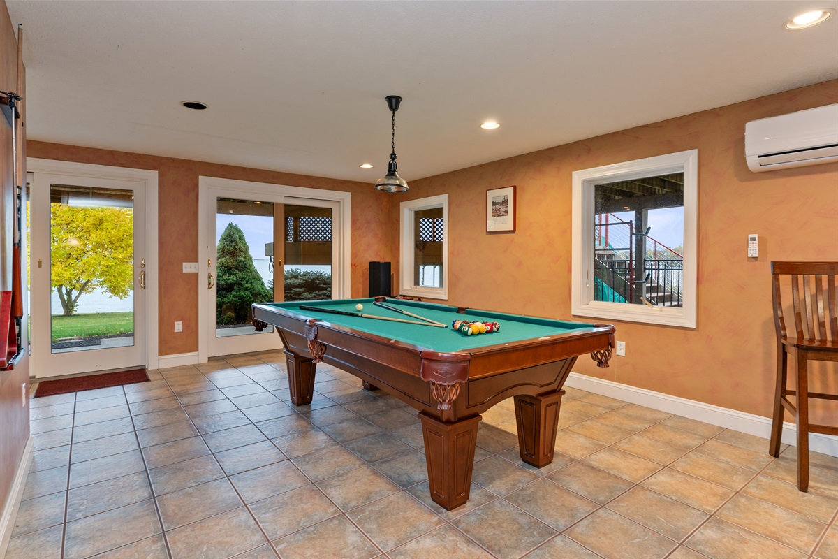 Lower level living room with bar and pool table