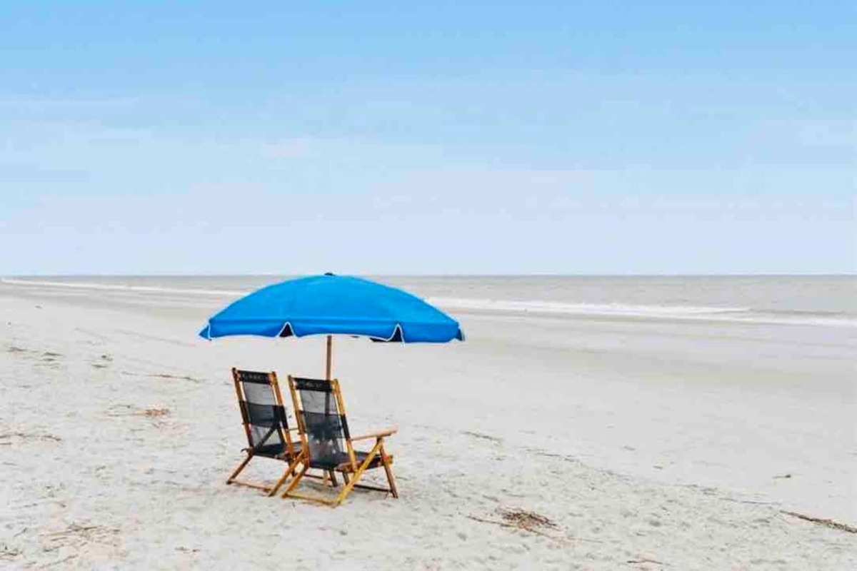Beach chairs and umbrella