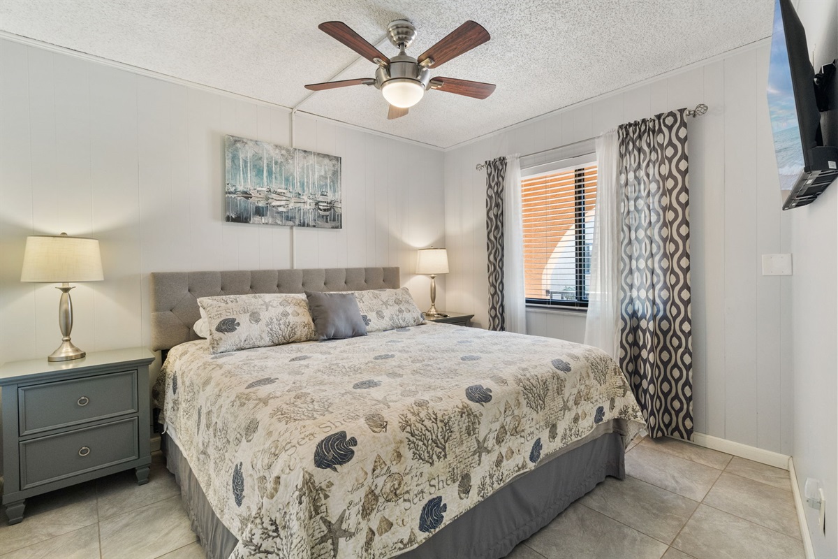King size bed in bedroom.