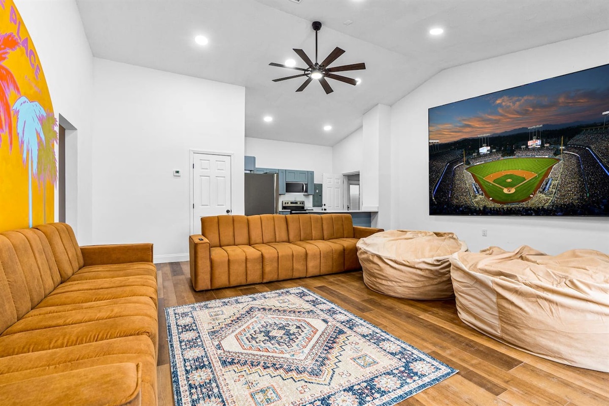 Game Room with 150-inch Screen open to Heated Salt Water Pool 