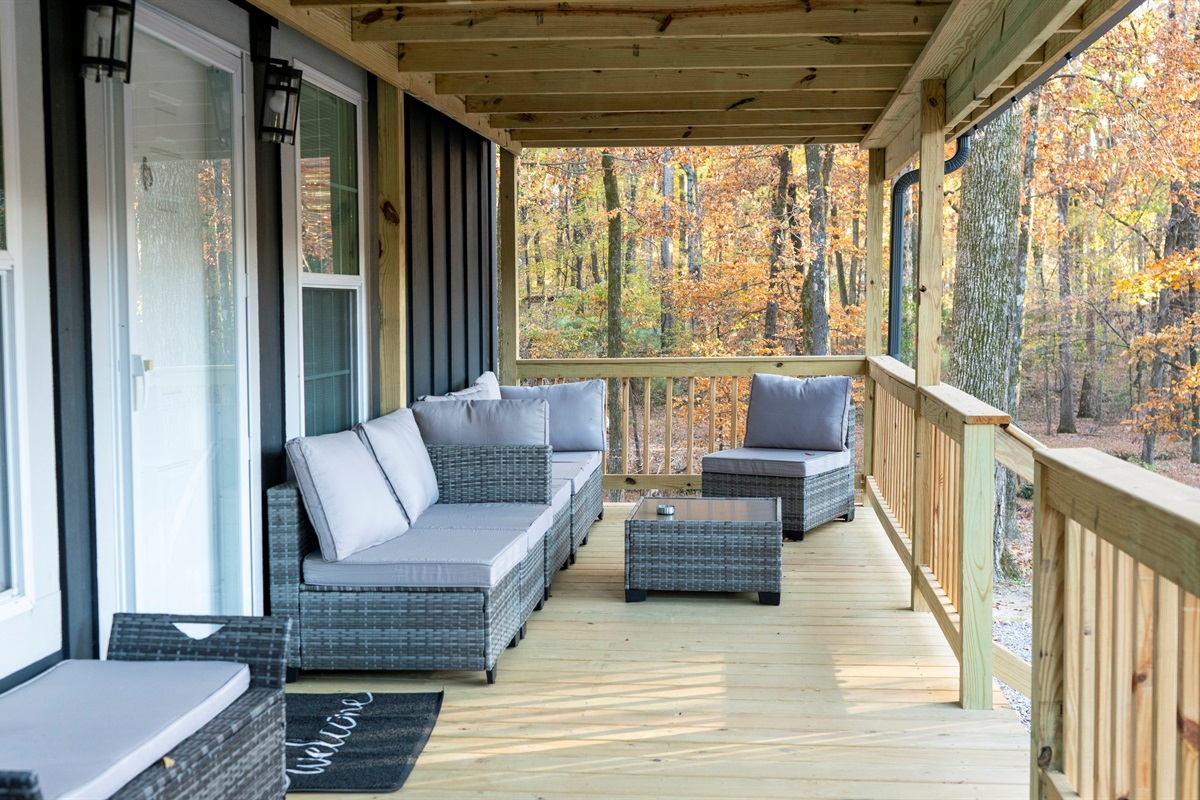 Ample seating on sectional sofa  on covered deck