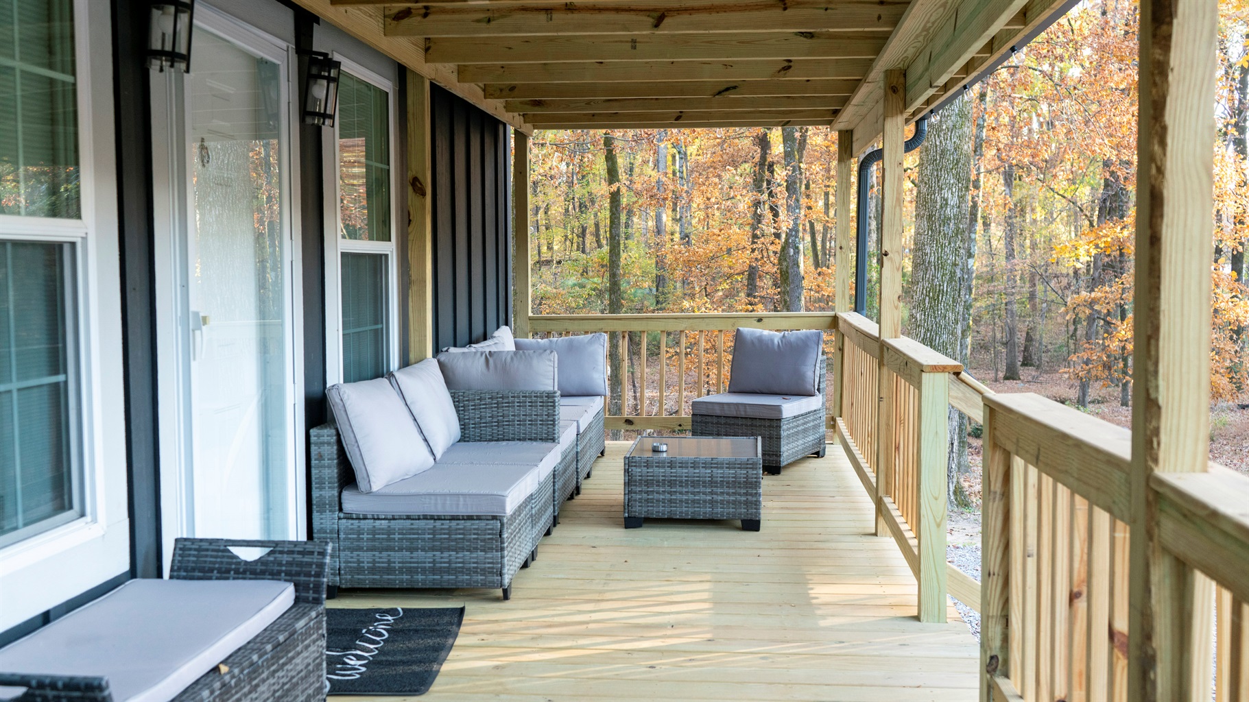 Ample seating on sectional sofa  on covered deck