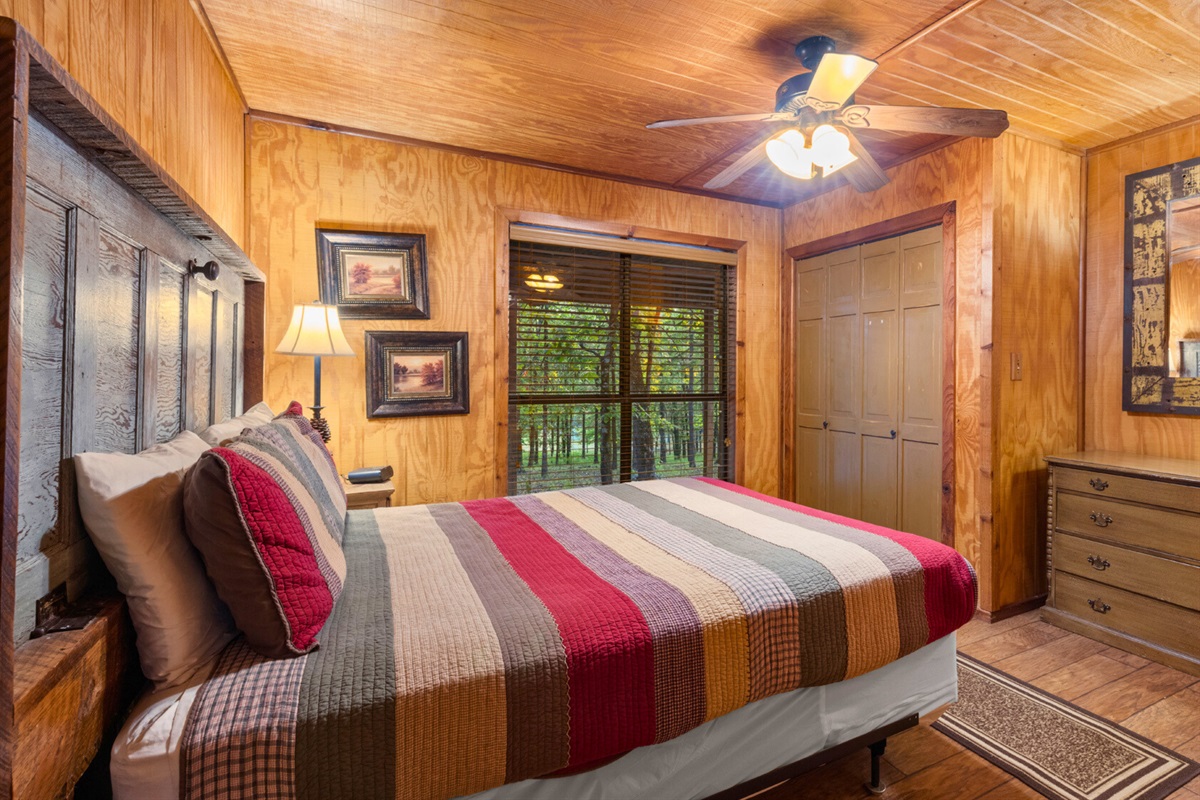 Warm and inviting space with queen bed and natural light.