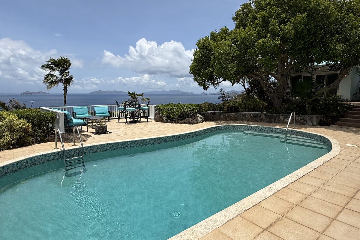 Step out of the living room sliders to the large pool deck