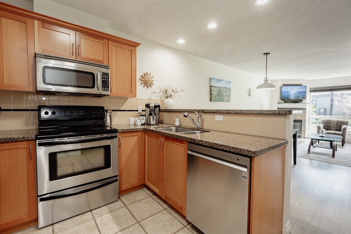 Unit A Modern Fully stocked Kitchen.