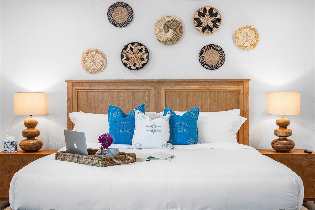 Layered neutrals and ocean-inspired accents set the tone for restful nights and slow, sunlit mornings.