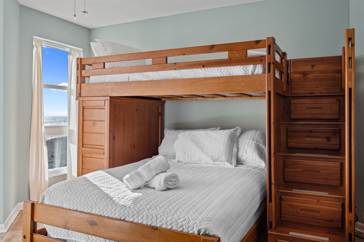 Second bedroom with a sturdy Twin-over-full bunk bed, perfect for kids or extra guests
