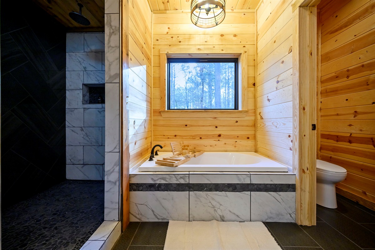Soaking tub with forest views&mdash;your private retreat after a day of exploring 🌲