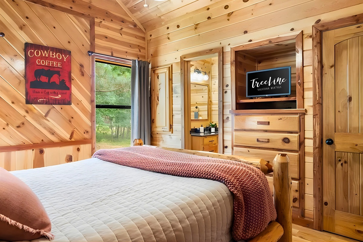 Another angle of the third bedroom shows comfortable space to unwind.