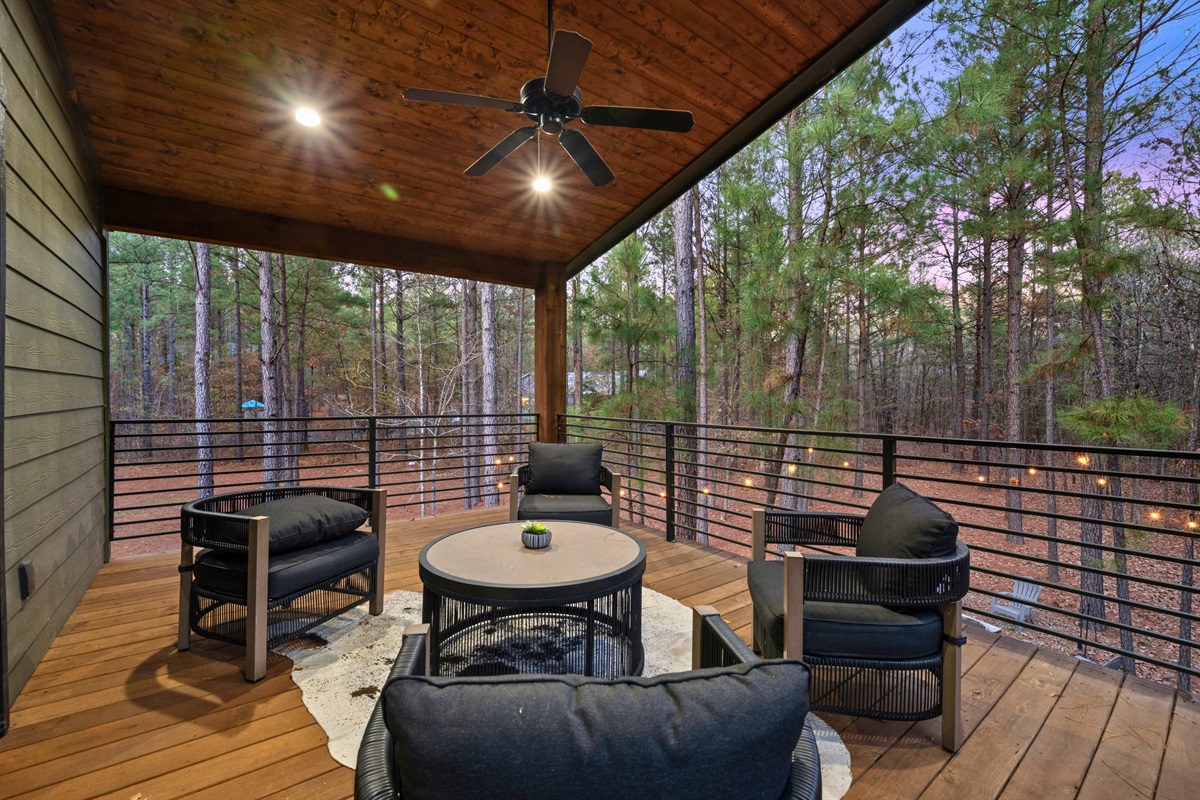 The upper covered deck provides a shaded, comfortable place to sit and enjoy the surroundings throughout the day.