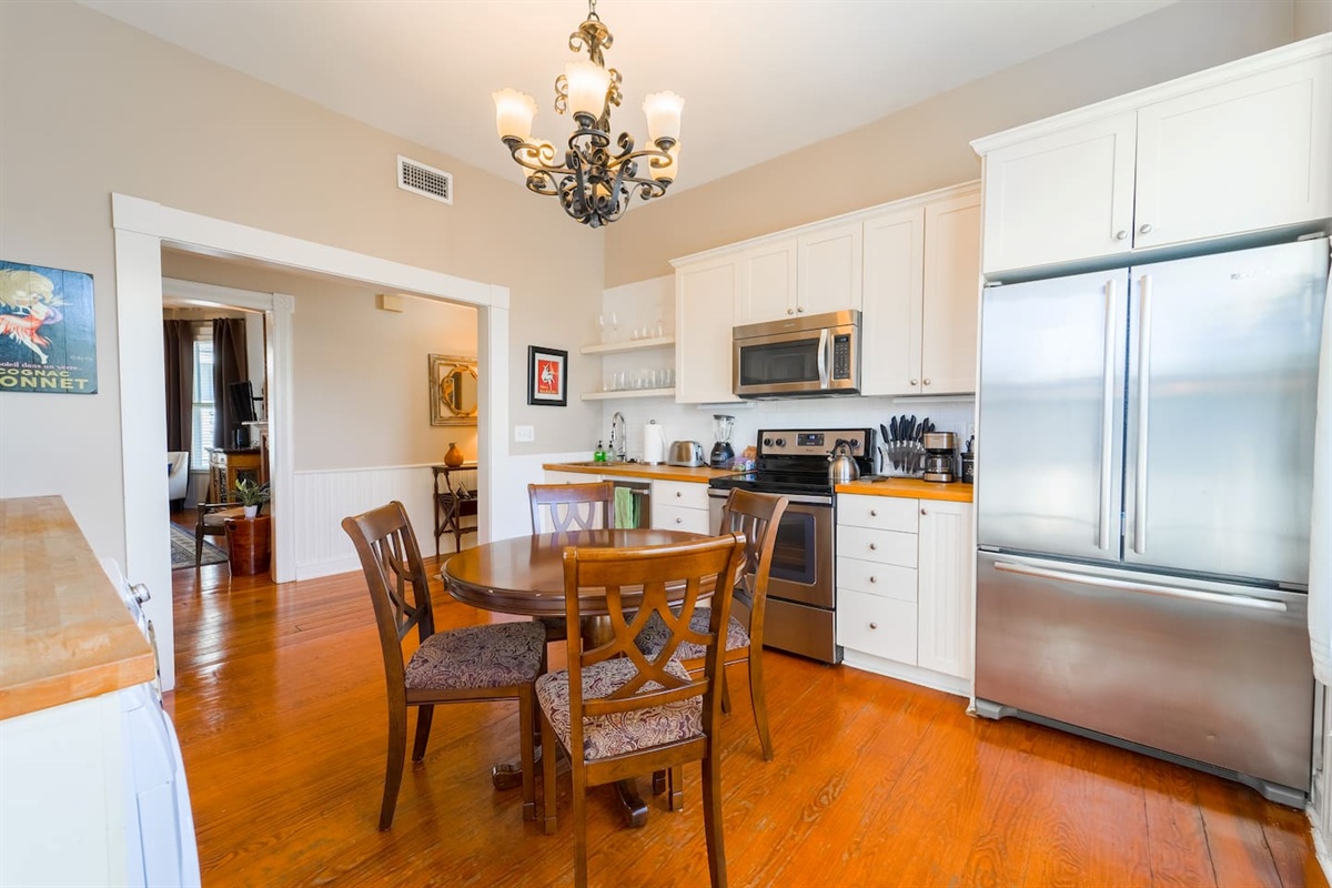 Full eat-in Kitchen with Stainless Steel appliances, including Large Fridge/Freezer, Range/Oven, Dishwasher, Microwave and Garbage disposal. All the flatware, place settings and cookware make you feel at home if you want that home-cooked meal. 