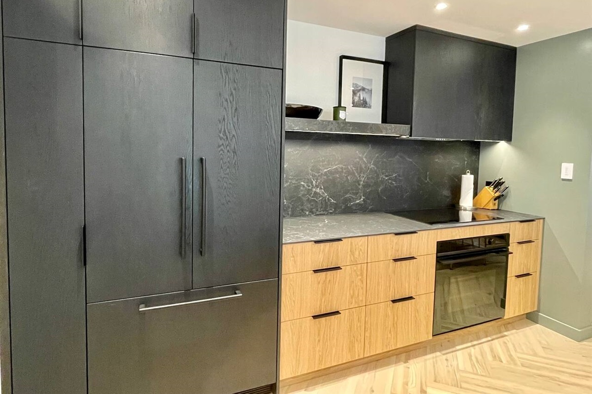 Large capacity Fisher Paykel Refrigerator anchors this spacious chef's kitchen  