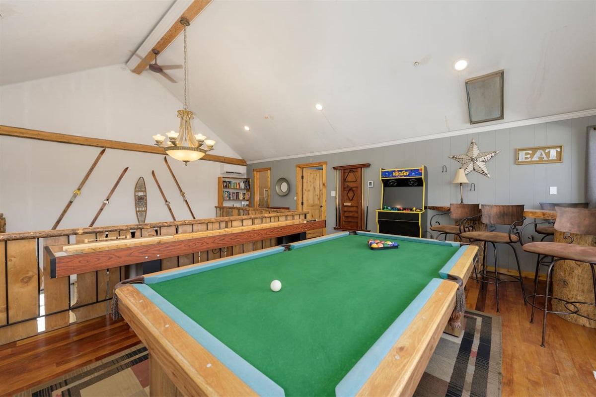 Upper living and game area