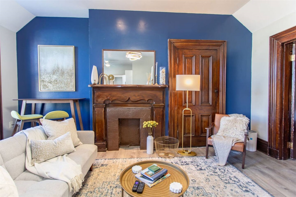 Stylish living room with comfortable, well-appointed furniture, creating a perfect space to relax and unwind.