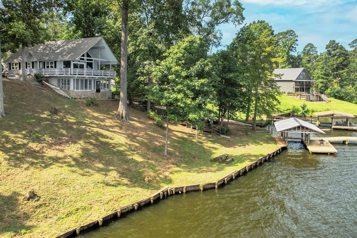 Drone photo for home, lakefront, and boathouse