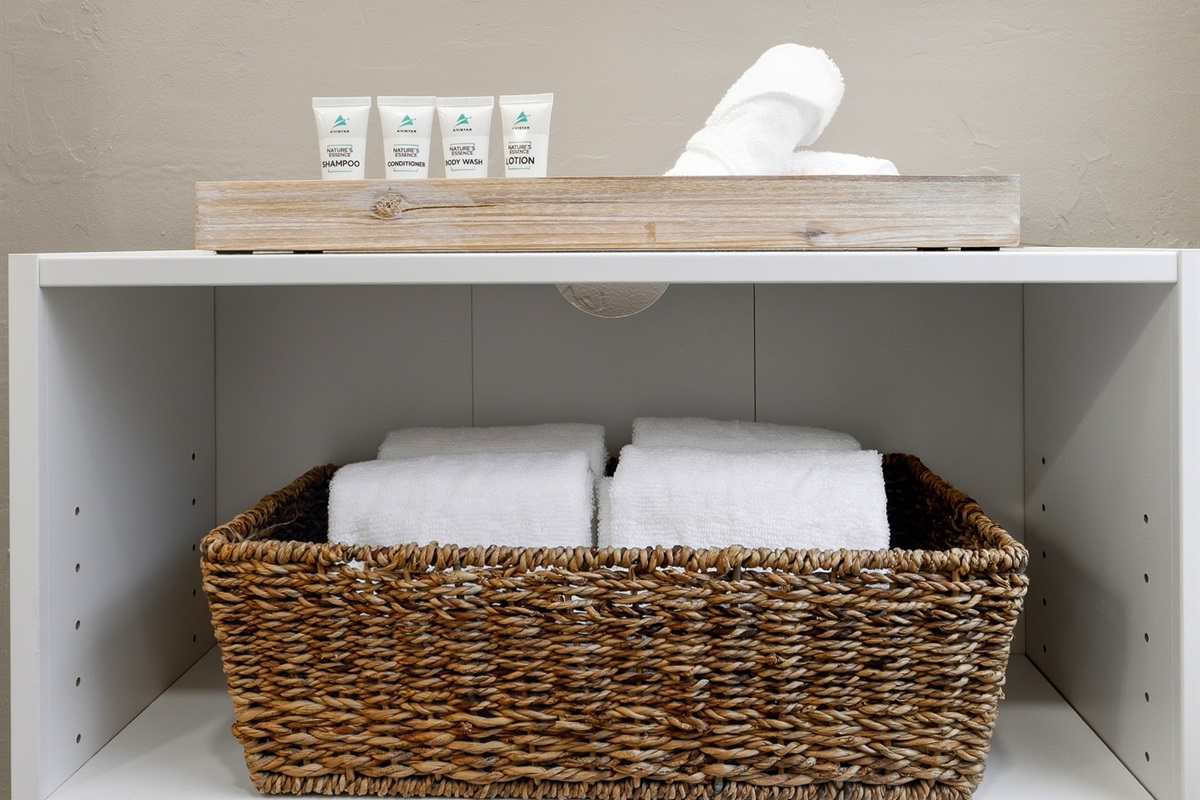 Fresh towels, washcloths, and toiletries stocked and ready for your arrival