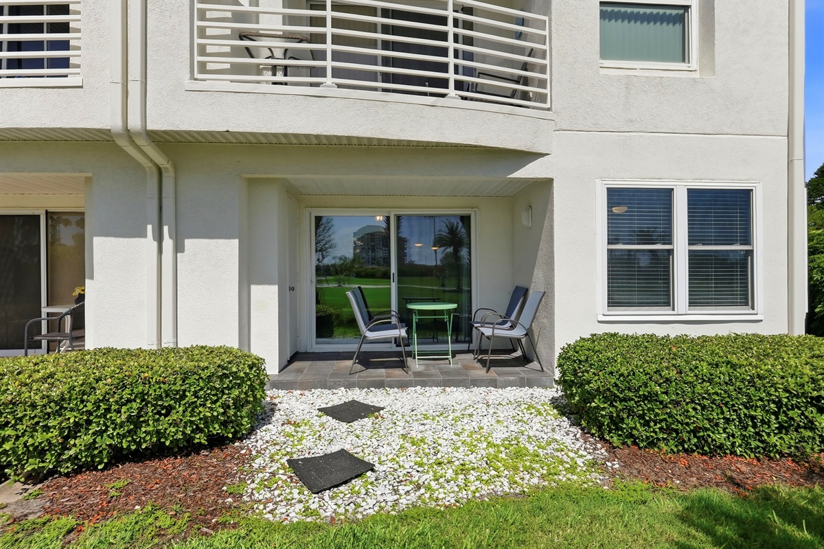 Step outside to your private patio, perfect for morning coffee, evening wine, or simply soaking in the Florida breeze.