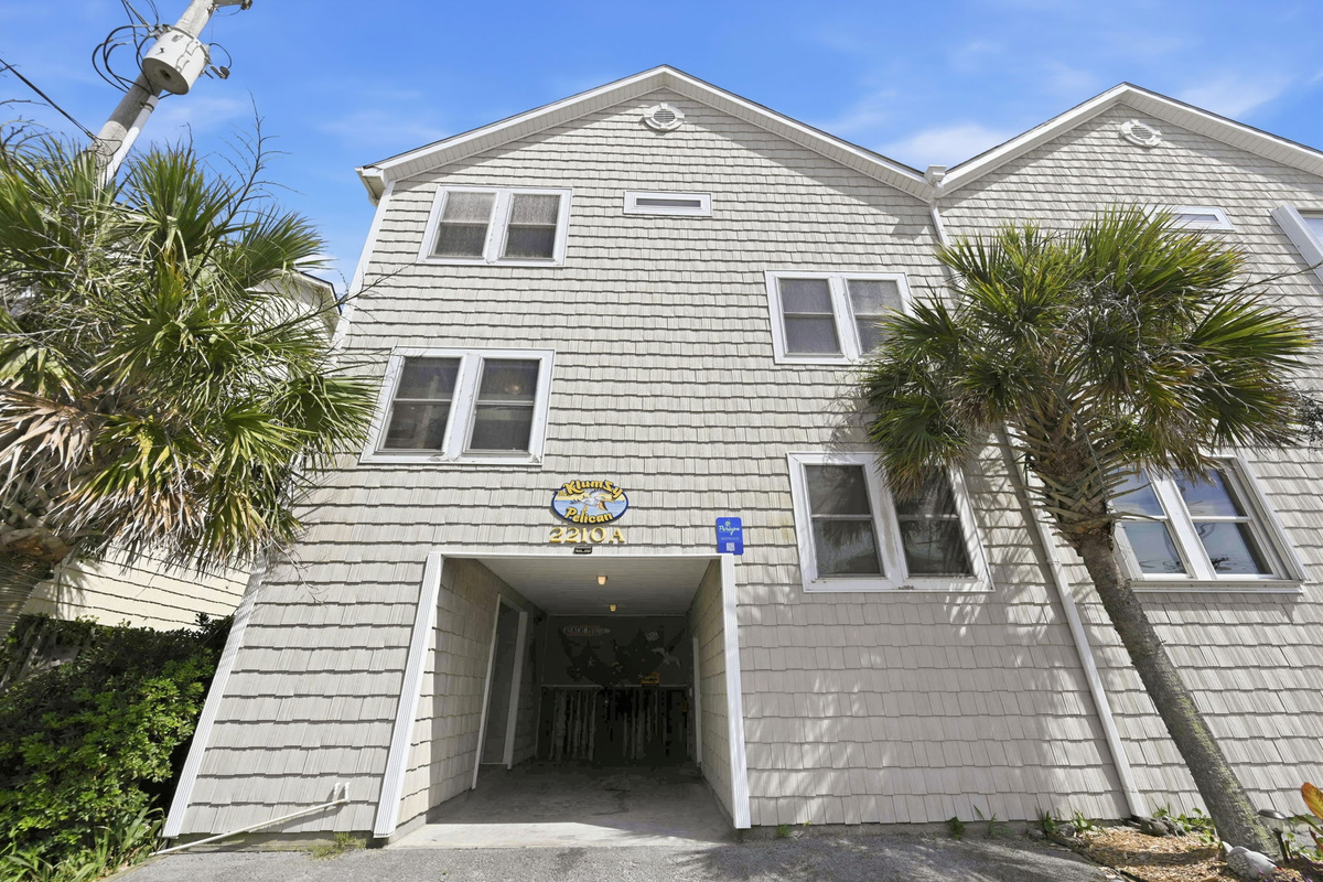 Covered entry and parking under the home