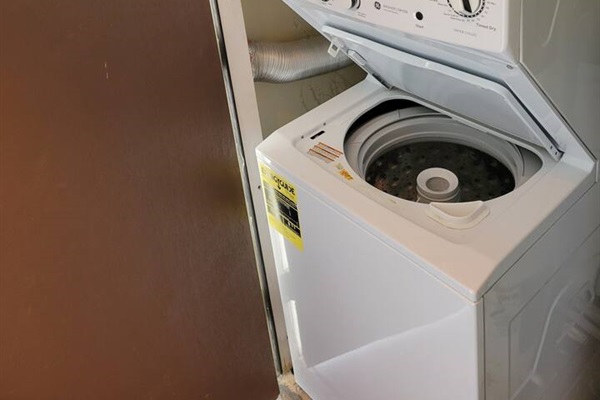 This property comes with a stacked washer and dryer (in storage closet by front door). I provide plenty of laundry pods and dryer sheets!