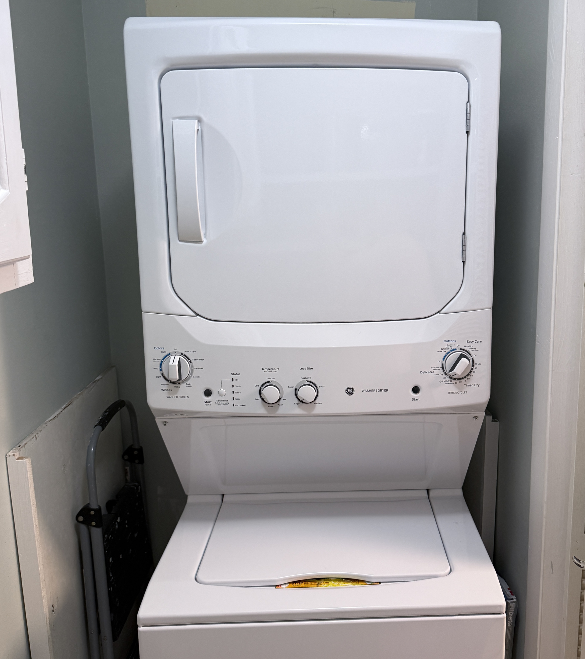 Stackable washer and dryer. We supply detergent pods for guest use.