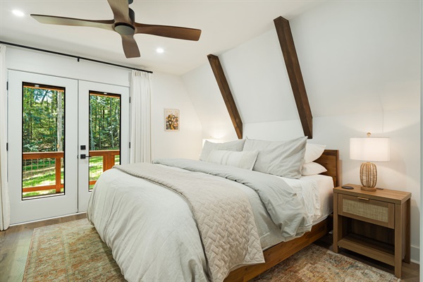 This bedroom on the first floor has a comfortable king size bed, nightstands, a dresser and a full size mirror. Also available is a closet with plenty of hangers and shelves for storing personal items and clothes. Extra blankets are also available.