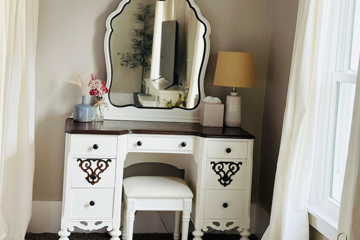 Primary-suite vanity offers a dedicated place to get ready.