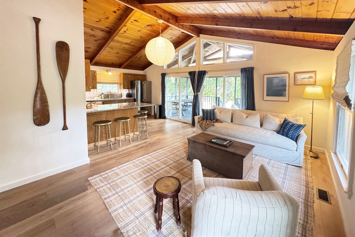 Open and spacious living room, with beautiful tongue and groove ceilings that run throughout the home. 