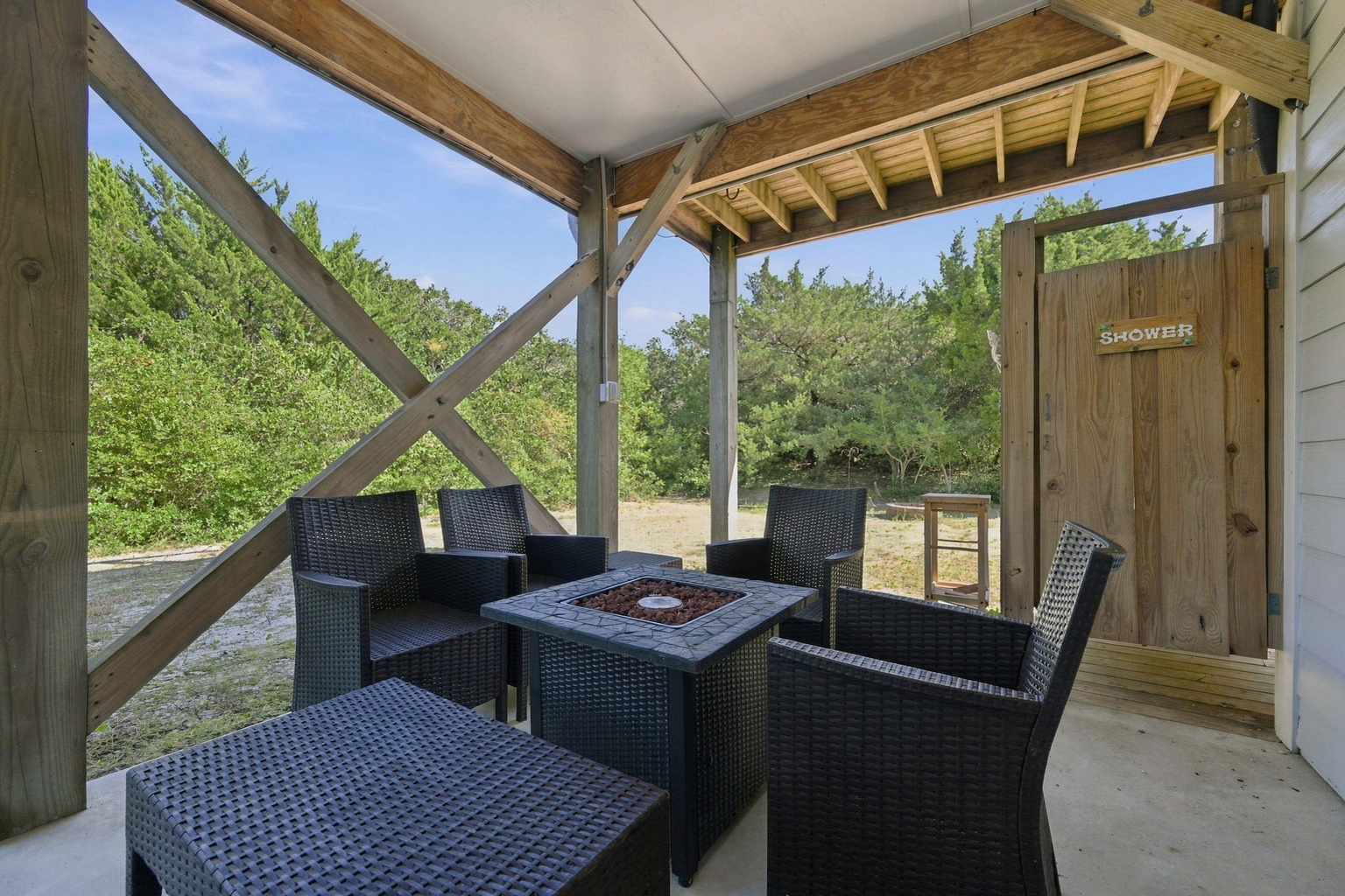 Gather around the outdoor fire pit for s’mores, laughter, and relaxing evenings under the coastal stars 