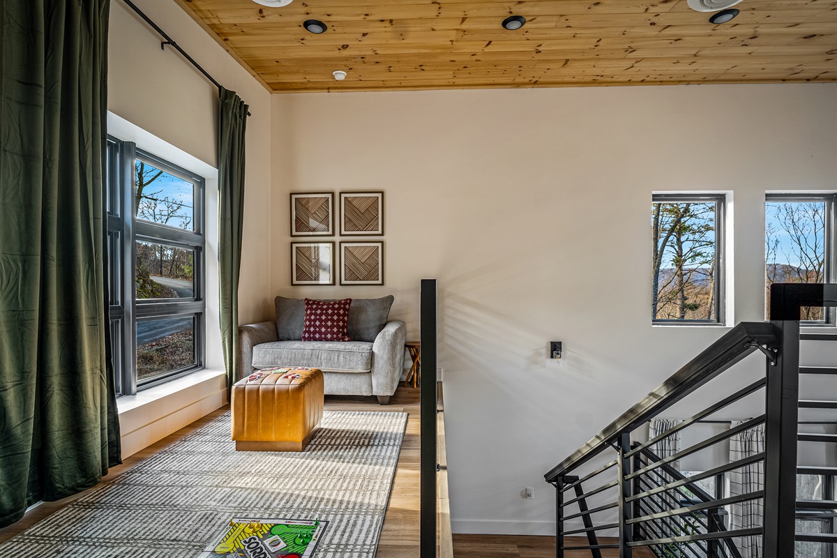 Loft overlooking the great room — cozy and inviting