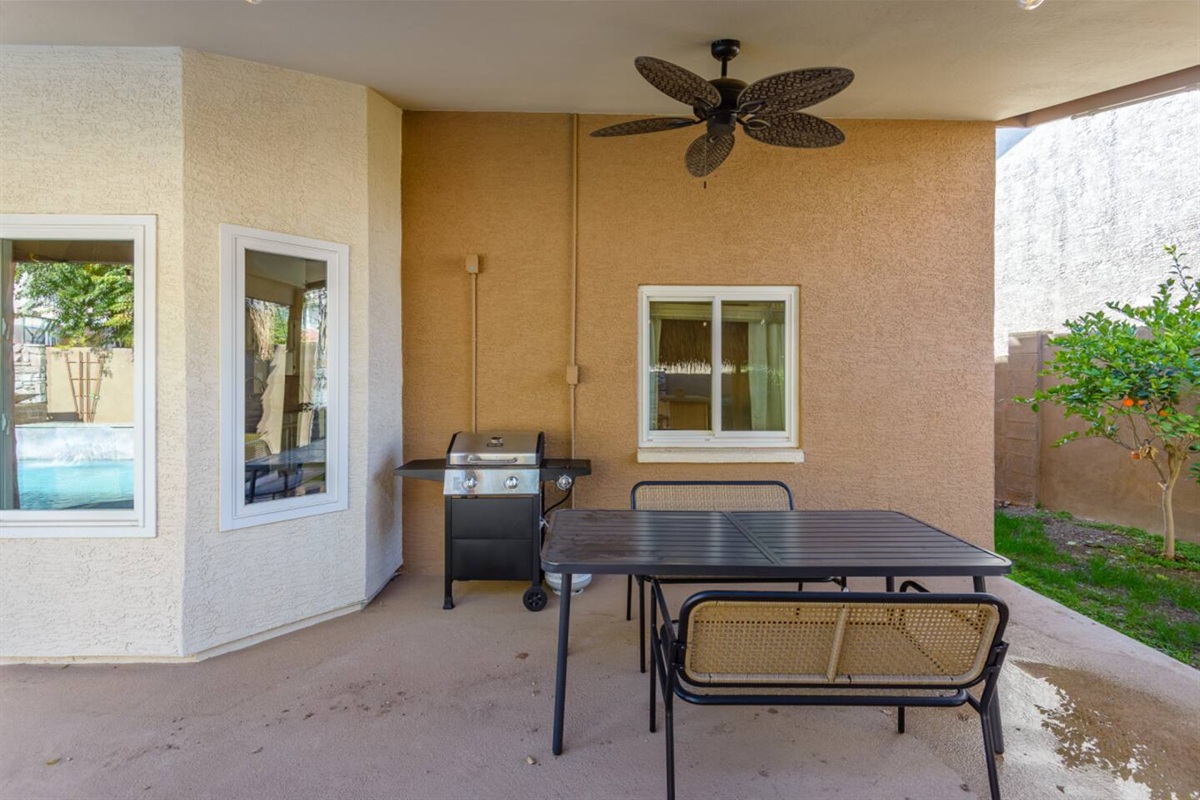 Covered outdoor seating area with window views and easy access from the home.