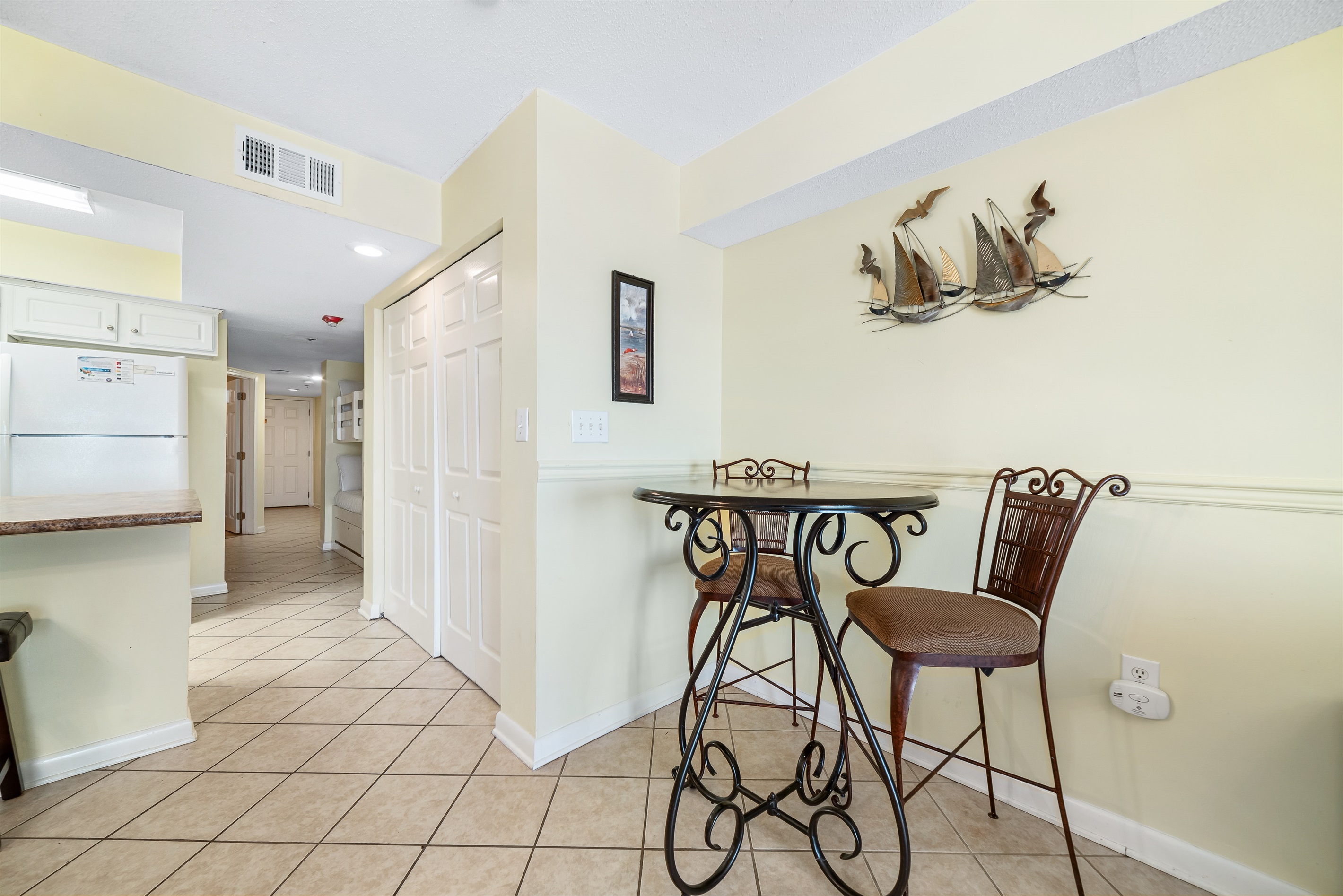 The natural textures and soft light create a serene atmosphere perfect for enjoying meals with a view.