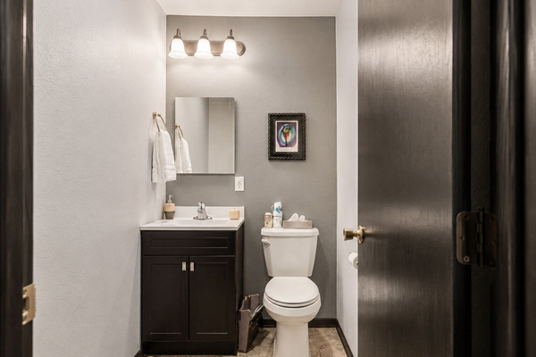 An additional upper-level half bath adds convenience and comfort during your stay.