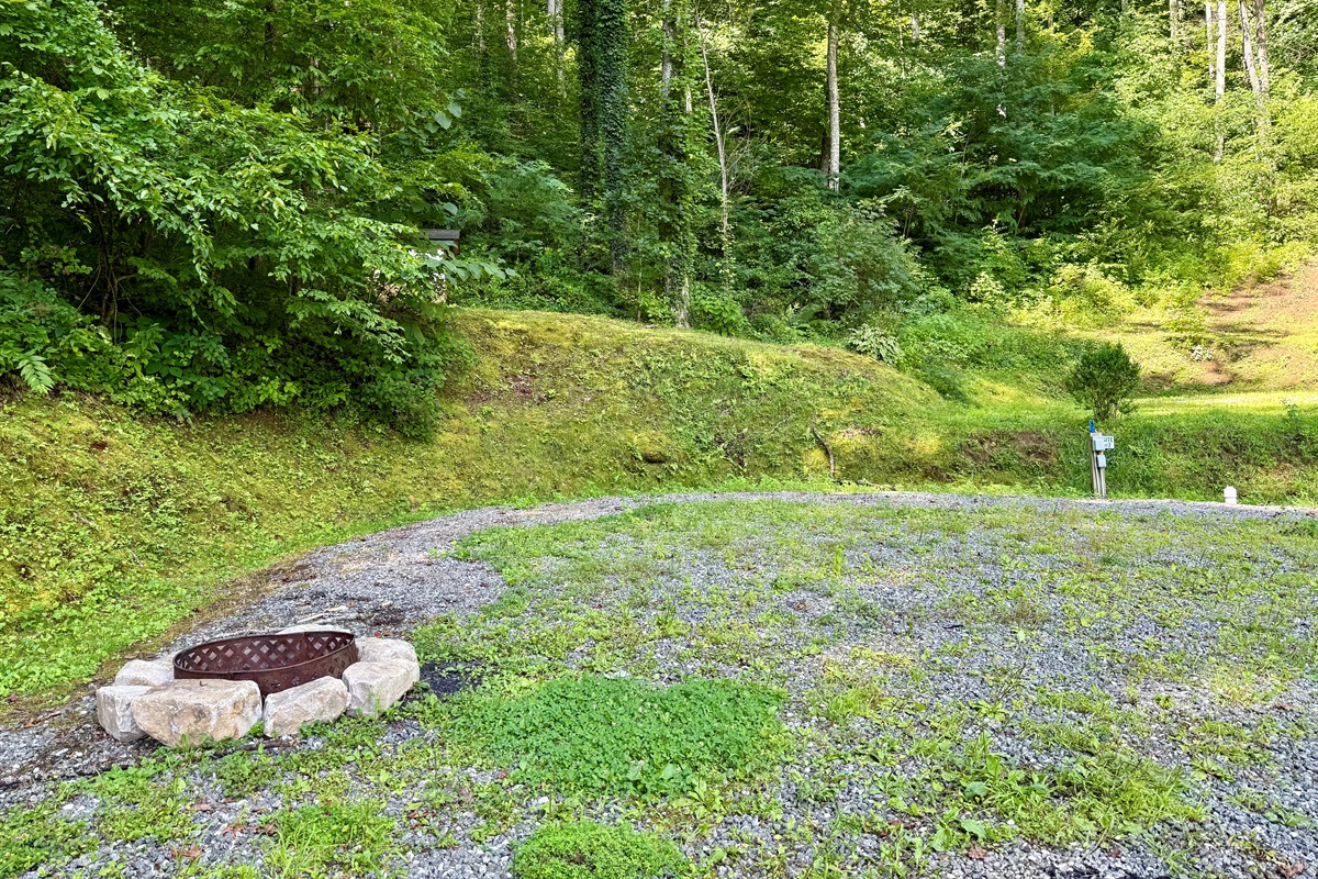 Site 2 — 50 amp power, water, sewer, and a fire ring ready for s’mores.