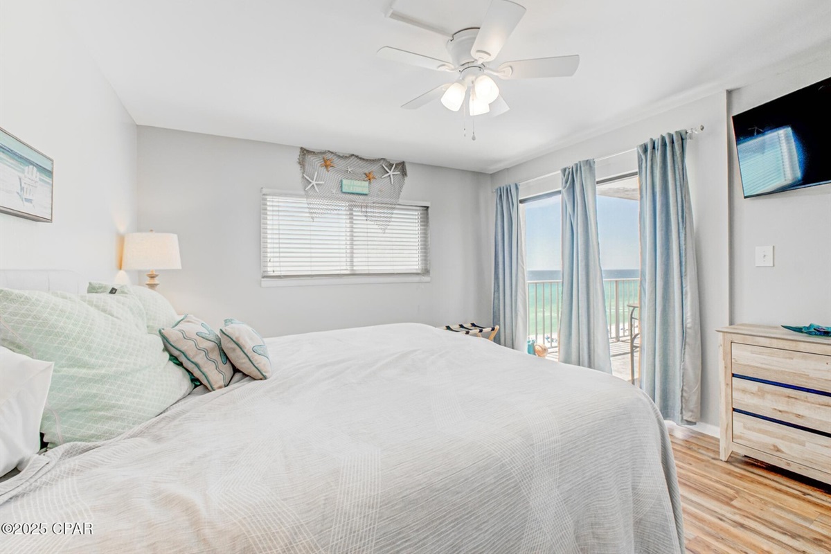 Master bedroom with King bed, Flat screen TV & dresser