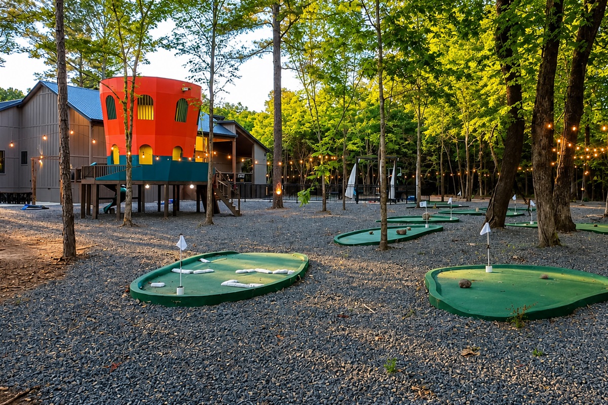 Outdoor Fun: Enjoy mini-golf under twinkling lights in this enchanting forest oasis!