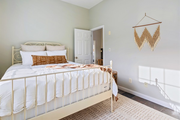 Welcome to our third bedroom on the main floor! Perfect for unwinding after a long day!