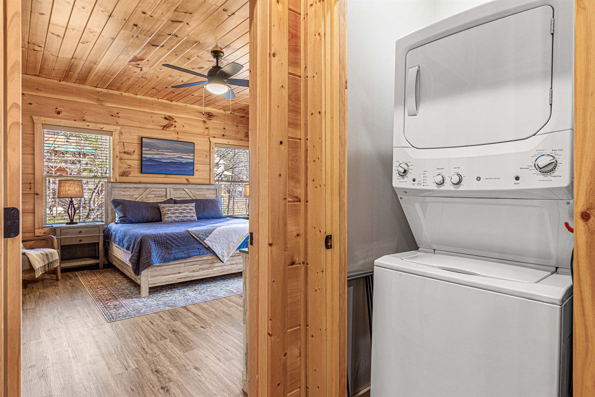 Full size washer and dryer are tucked in a closet for quiet laundry care.