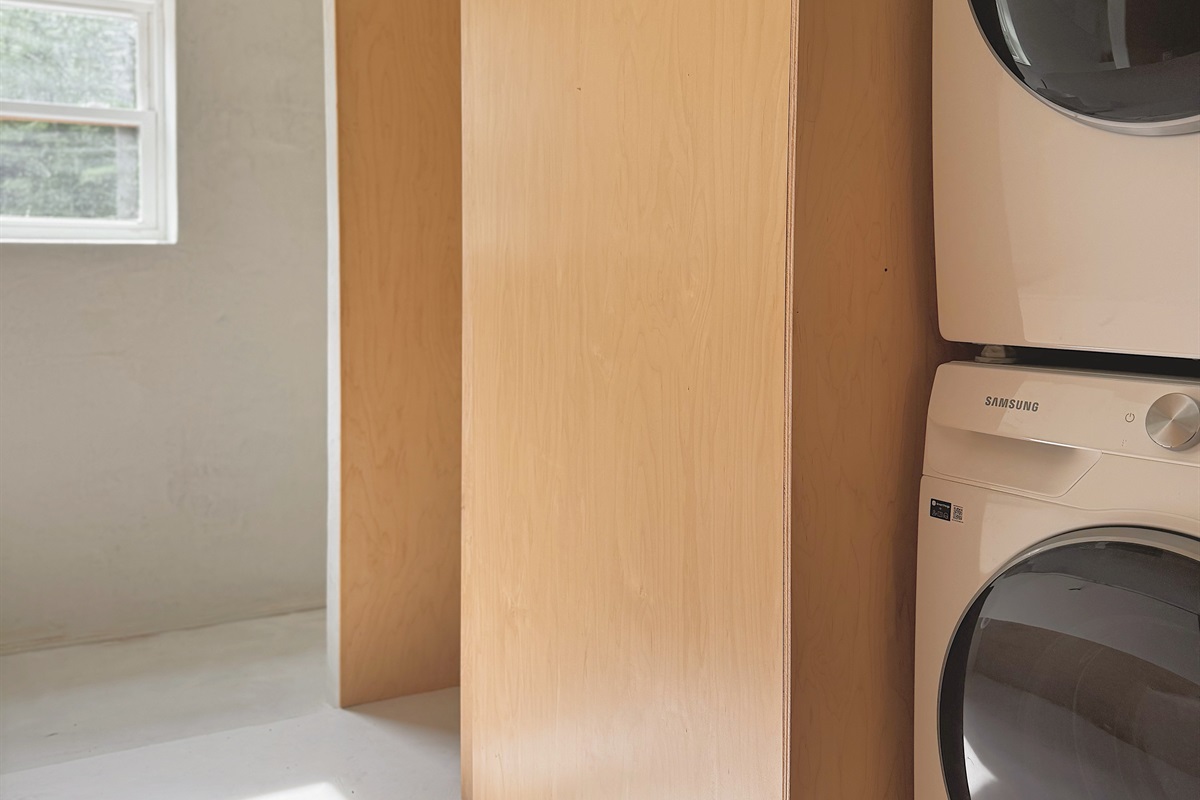 Washer and dryer is located upstairs.