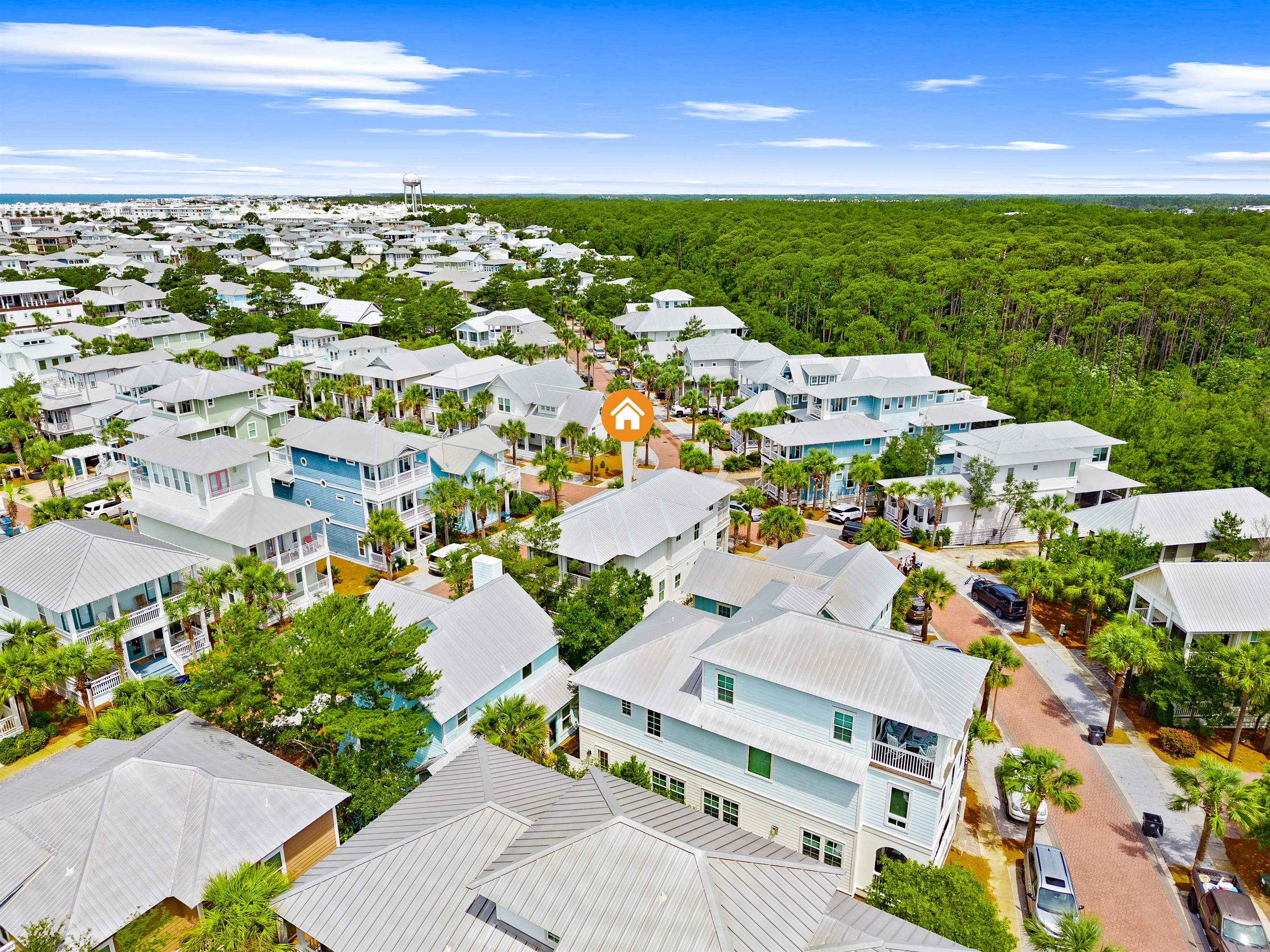 Take in the beauty of Seacrest Beach from above, where charming coastal homes, winding streets, and lush landscaping create a welcoming setting for your 30A getaway.