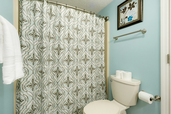 The second full bath includes a tub and shower combination, ideal for guests who prefer a relaxing soak.