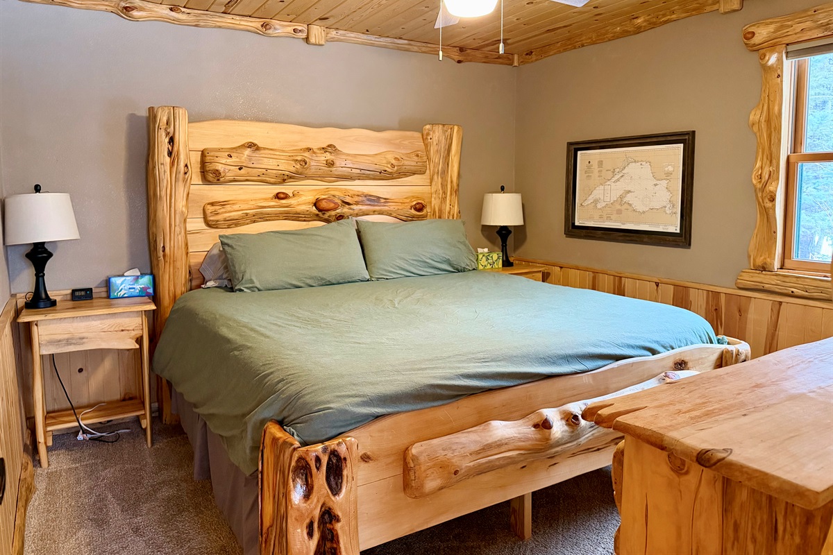 Cozy king bedroom located conveniently off the kitchen and living room. A quiet retreat after a day on the North Shore.