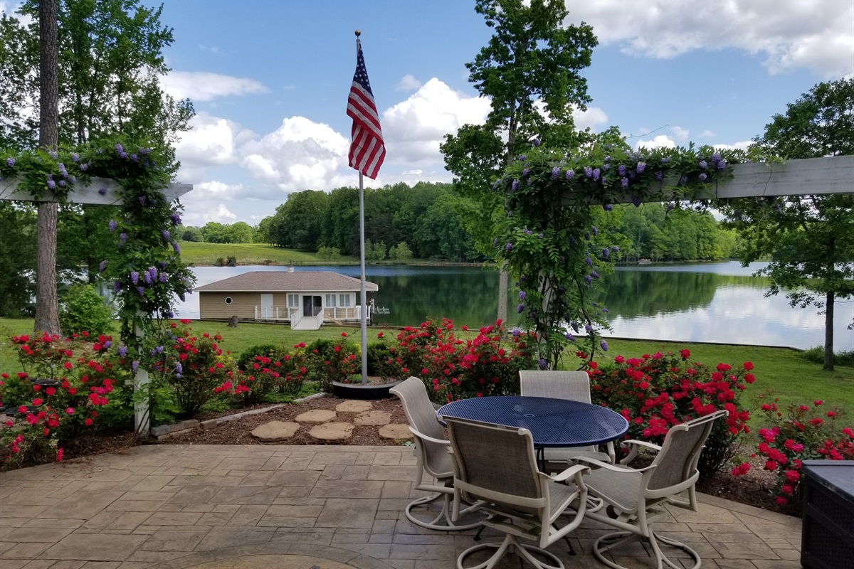 Patio perfection with a lakefront backdrop.
