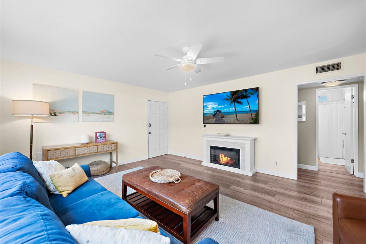 The living room has a 70" smart TV for movie night.  Over 10 streaming services, live sports. and 200+ movies in our Amazon library.